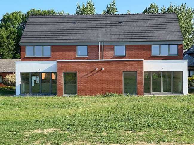 Réalisation Dinjart - Châssis pvc à Meux - Logement d'accueil